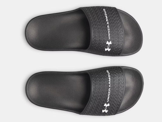 Sandales UA ARMR Shower - Under Armour noires en EVA léger, antidérapantes, pour garçon, vue de dessus.