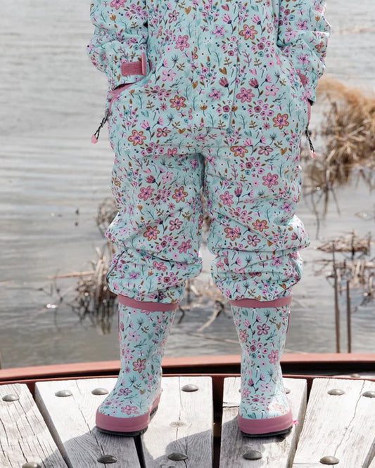 Bottes de pluie - Deux Par Deux en caoutchouc naturel blanc à motifs floraux roses et verts, pour enfant, vue portée de face.