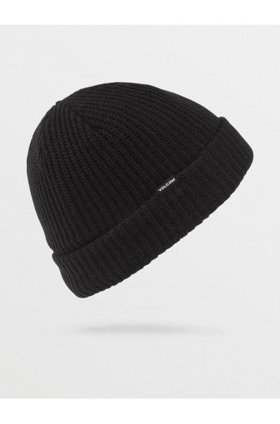 Bonnet noir en maille côtelée avec revers replié, vue de profil sur fond clair