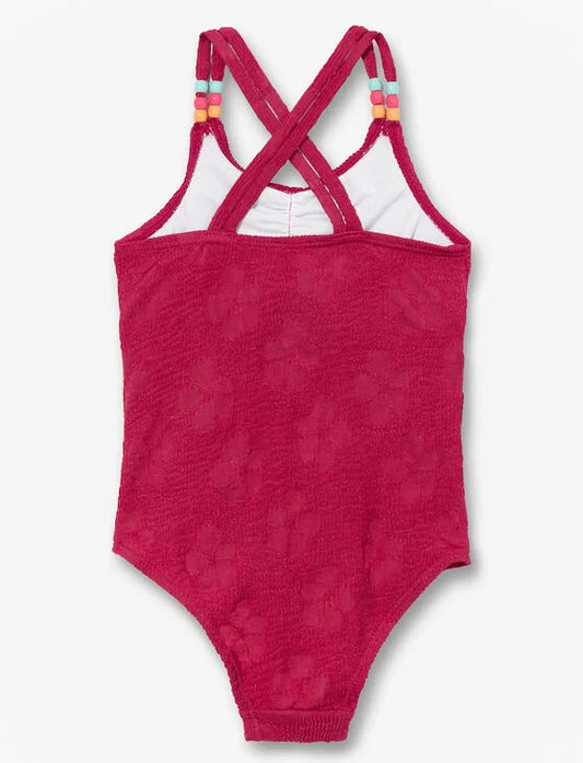 Maillot de bain - M.I.D. rose foncé texturé avec bretelles croisées et perles colorées, vue de dos enfant fille