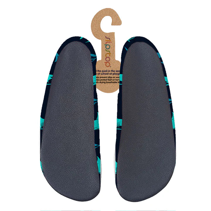 Slip Stop chaussons antidérapants bleu marine à motifs verts pour enfant vue de dessus avec semelle noire détaillée