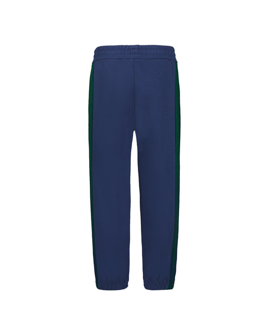 Pantalon - Under Armour bleu marine avec bandes latérales vertes, taille et chevilles élastiquées, vue de face