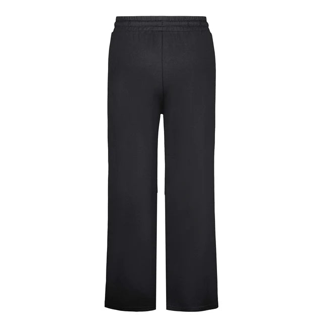 Pantalon - Under Armour noir en tissu technique, coupe droite avec taille élastique, vue de face, modèle adulte.