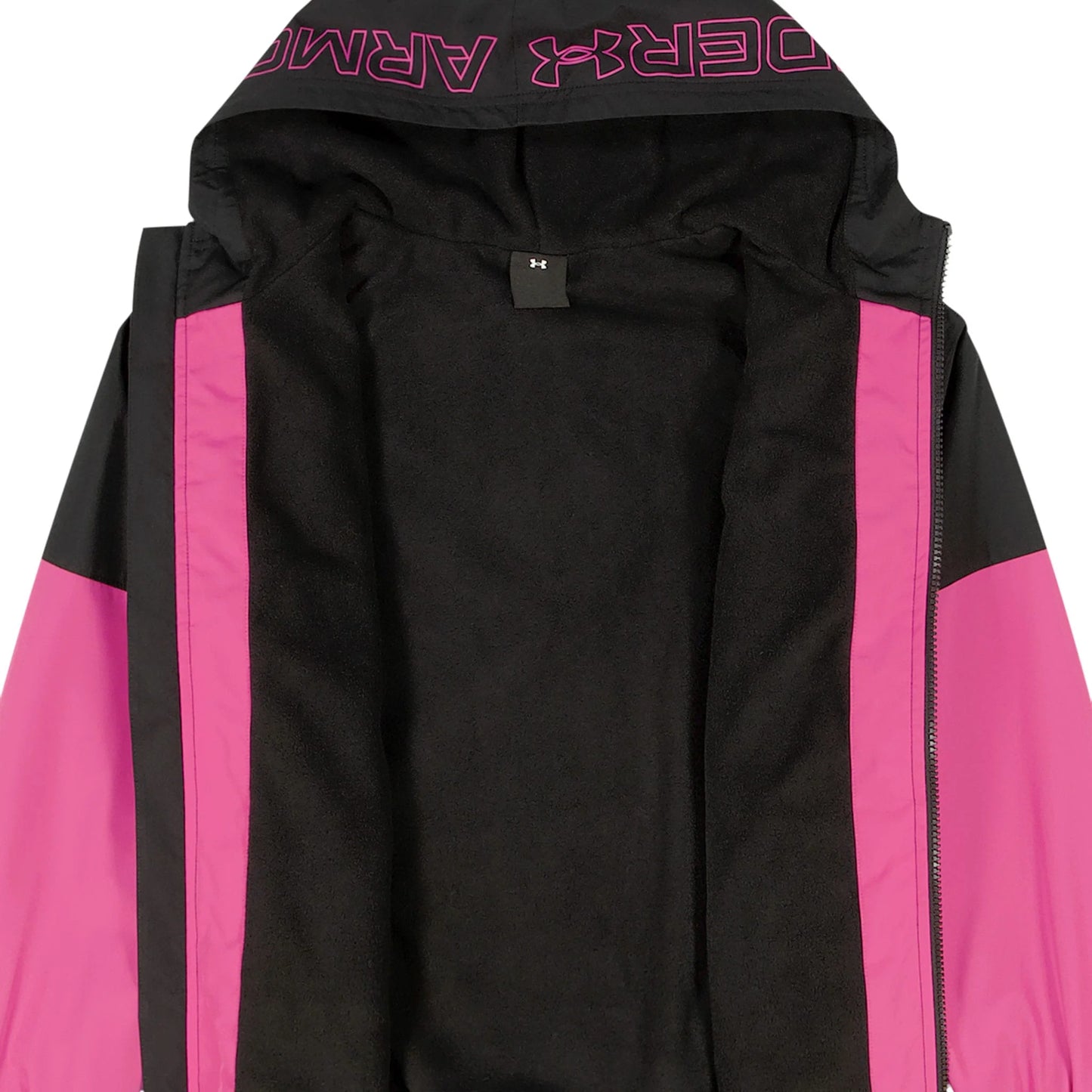 Intérieur en tissu polaire noir du Manteau Mi-Saison - Under Armour avec manches et détails roses.