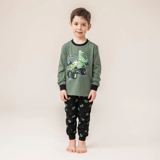 Pyjama - Nanö garçon vert manches longues avec imprimé dinosaure, pantalon noir motifs verts, vue de face porté sur mannequin.