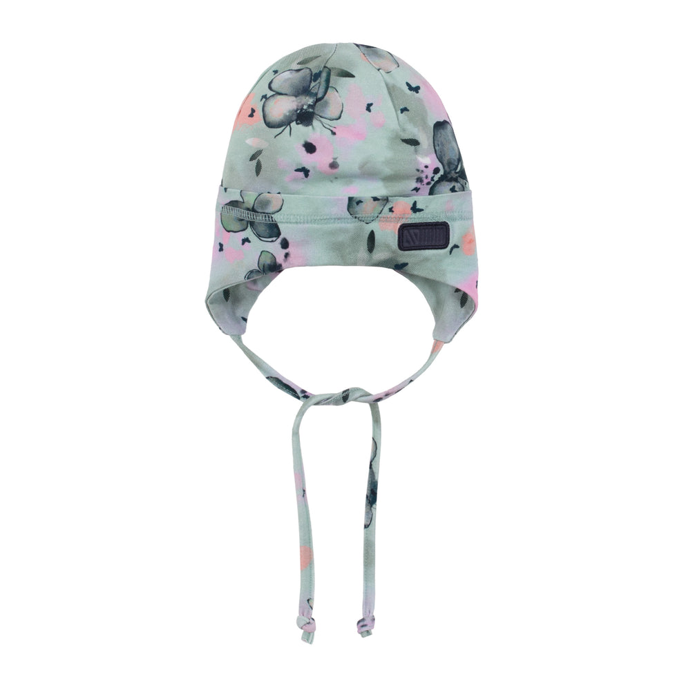 Tuque Mi-Saison - Nanö en jersey doux imprimé fleurs grises et roses, pour bébé fille, vue de face avec cordons attachés.