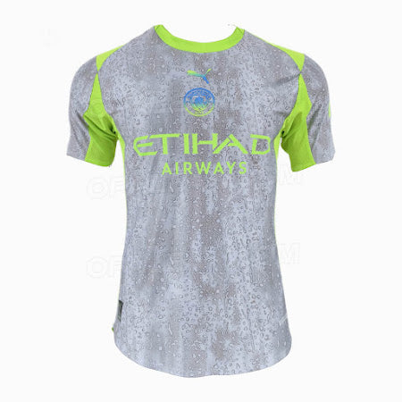 Jersey - Puma gris à motifs texturés avec détails verts fluo, manches courtes, pour garçon, vue de face.