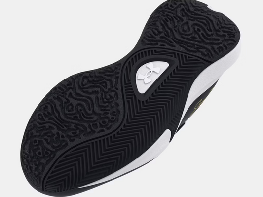 Espadrilles Lockdown 7 - Under Armour semelle extérieure noire et blanche avec logo, vue de dessous détaillée pour enfant.