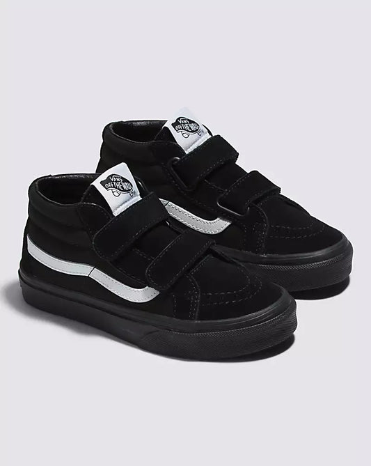 Chaussures - Sk8-Mid Reissu noires et blanches en toile et suède pour enfant, modèle mi-haut avec lanières, vue biais côté droit.
