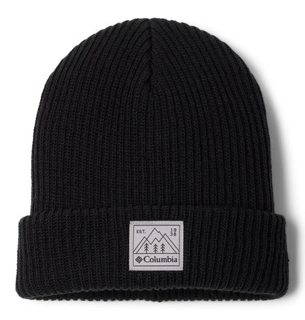 Tuque d'hiver - Columbia noire en tricot côtelé avec revers, détail de l'étiquette frontale, vue de face.