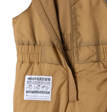 Habit de neige Buga Set - Columbia beige en tissu technique isolant avec fermeture zippée et étiquette d'instructions, vue détaillée rapprochée.