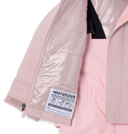 Veste rose pâle pour enfant avec doublure intérieure argentée brillante, détail cousu et étiquette technique, vue intérieure ouverte.