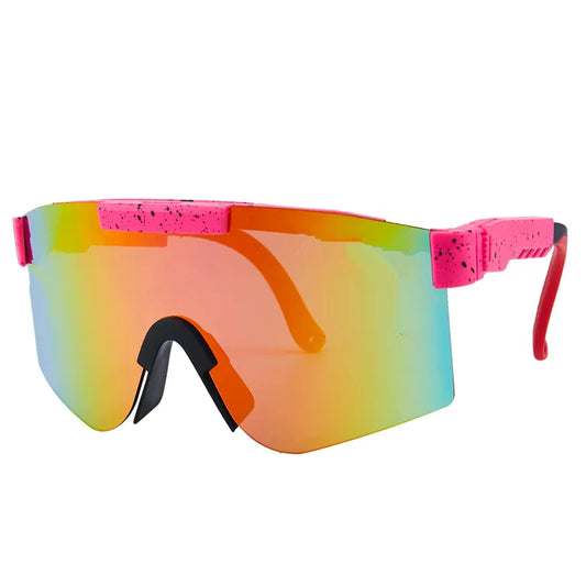 Lunettes de soleil - Kids Windshield avec verre miroir orange et bleu, monture rose fluo, style couvrant, pour enfant, vue de face.