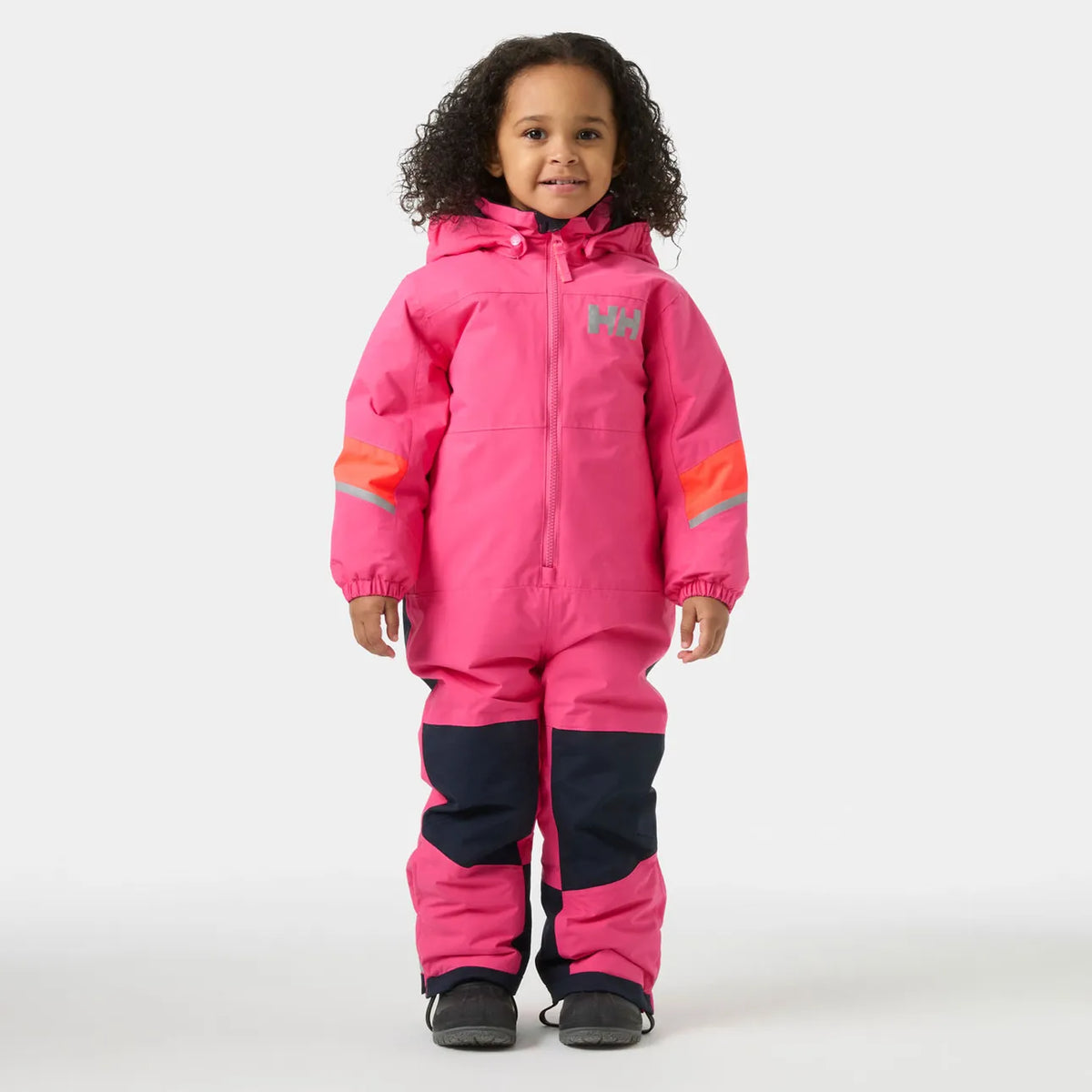 Habit de neige Rider 3.0 Insulated Snow Suit - Helly Hansen rose et noir porté par une fille vue de face