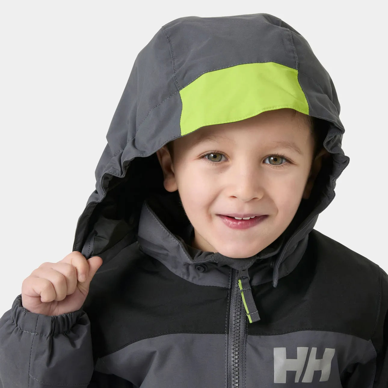 Habit de neige Rider 3.0 Insulated Snow Suit - Helly Hansen noir et gris avec capuchon vert fluo pour garçon vue de face