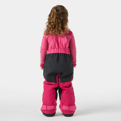 Salopette de neige Rider - Helly Hansen pour enfant, bicolore rose et gris foncé, vue de dos portée sur mannequin fille.