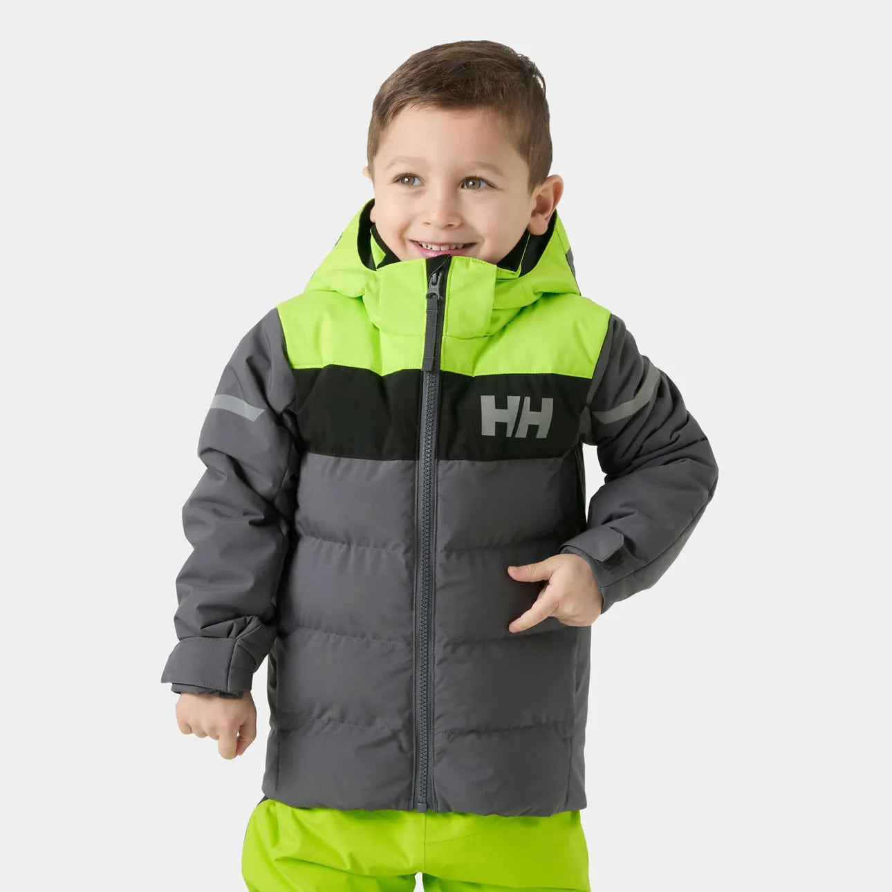 Manteau d'hiver Vertical - Helly Hansen pour enfant garçon, coupe droite, couleurs vert fluo, noir et gris, vue de face porté sur mannequin.