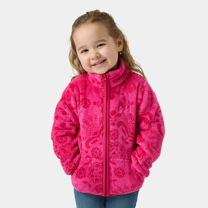 Veste polaire Chill - Helly Hansen rose vif à motifs floraux en tissu polaire, pour enfant fille, vue de face portée sur mannequin souriante.