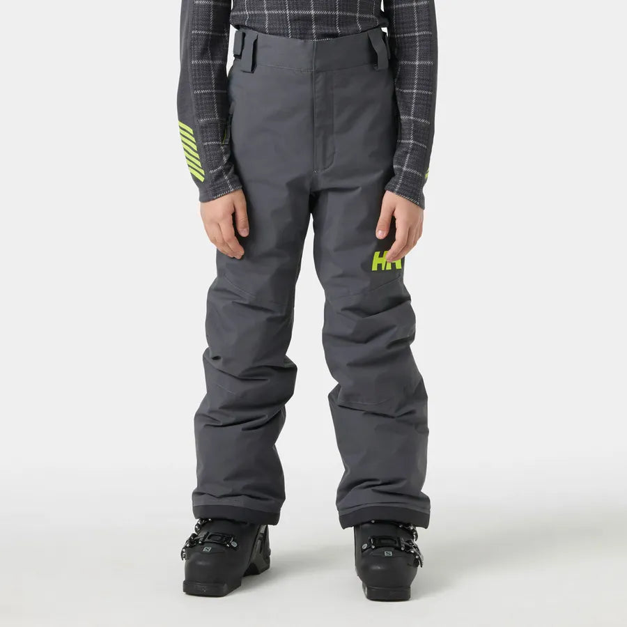Pantalon de neige - Helly Hansen gris foncé pour enfant, poches latérales et coupe ample, vue de face porté par un modèle