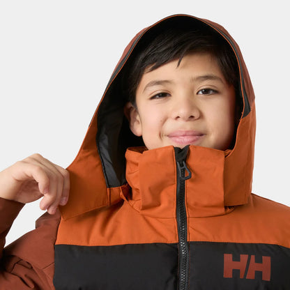 Manteau d'hiver Cyclone - Helly Hansen orange et noir à capuche, porté par un enfant, vue de face