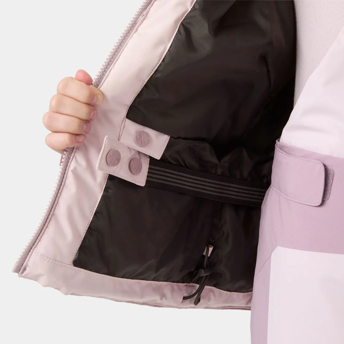 Manteau d'hiver Snowbliss - Helly Hansen rose pâle et lilas avec doublure noire et fermeture éclair intérieure vue de détail