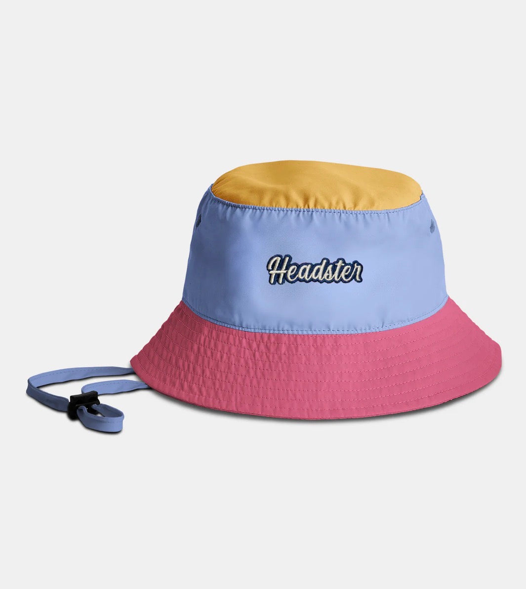 Chapeau Lakeshore Nylon - Headster bicolore jaune, bleu et rose en nylon, style bob, vue de face avec cordon ajustable.