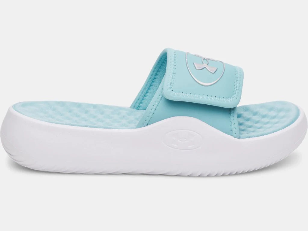 Sandales  UA Ignite Pro 8 -  Under Armour bleu clair avec sangle réglable mat et semelle blanche, vue de profil côté intérieur.