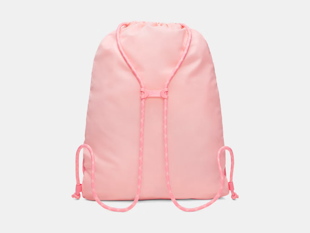 Sac à cordons UA Hustle  - Under Armour rose clair en tissu synthétique, vue dos avec sangles ajustables.