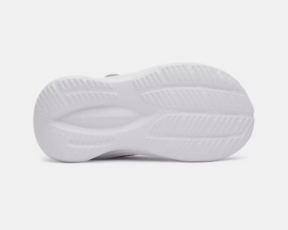 Semelle blanche détaillée de l'Espadrilles UA Assert 11 AC - Under Armour, vue de dessous montrant le motif antidérapant.
