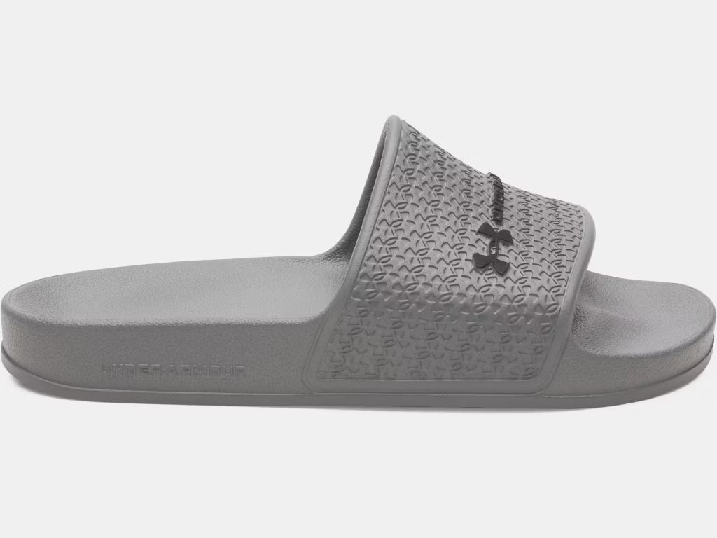 Sandales UA ARMR Shower - Under Armour grises en EVA pour garçon, vue de profil côté droit, semelle texturée antidérapante.