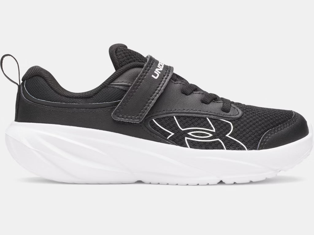 Espadrilles Surge 5 - Under Armour noires avec semelle blanche, bout arrondi, fermeture avec lacets et velcro, vue de profil côté extérieur.