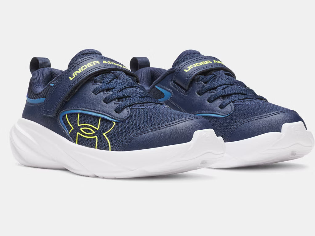 Espadrilles Surge 5 - Under Armour bleu marine et jaune pour enfant, style sport avec fermeture scratch, vue de trois quarts avant.