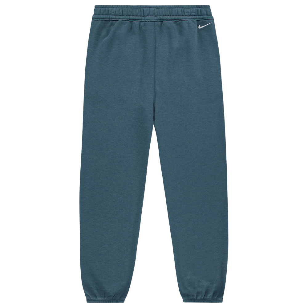 Pantalon ACG - Nike bleu pétrole de style jogging avec taille et chevilles élastiquées logo Nike visible vue de face