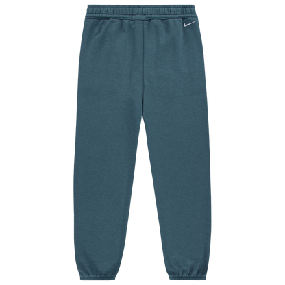 Pantalon ACG - Nike bleu pétrole de style jogging avec taille et chevilles élastiquées logo Nike visible vue de face