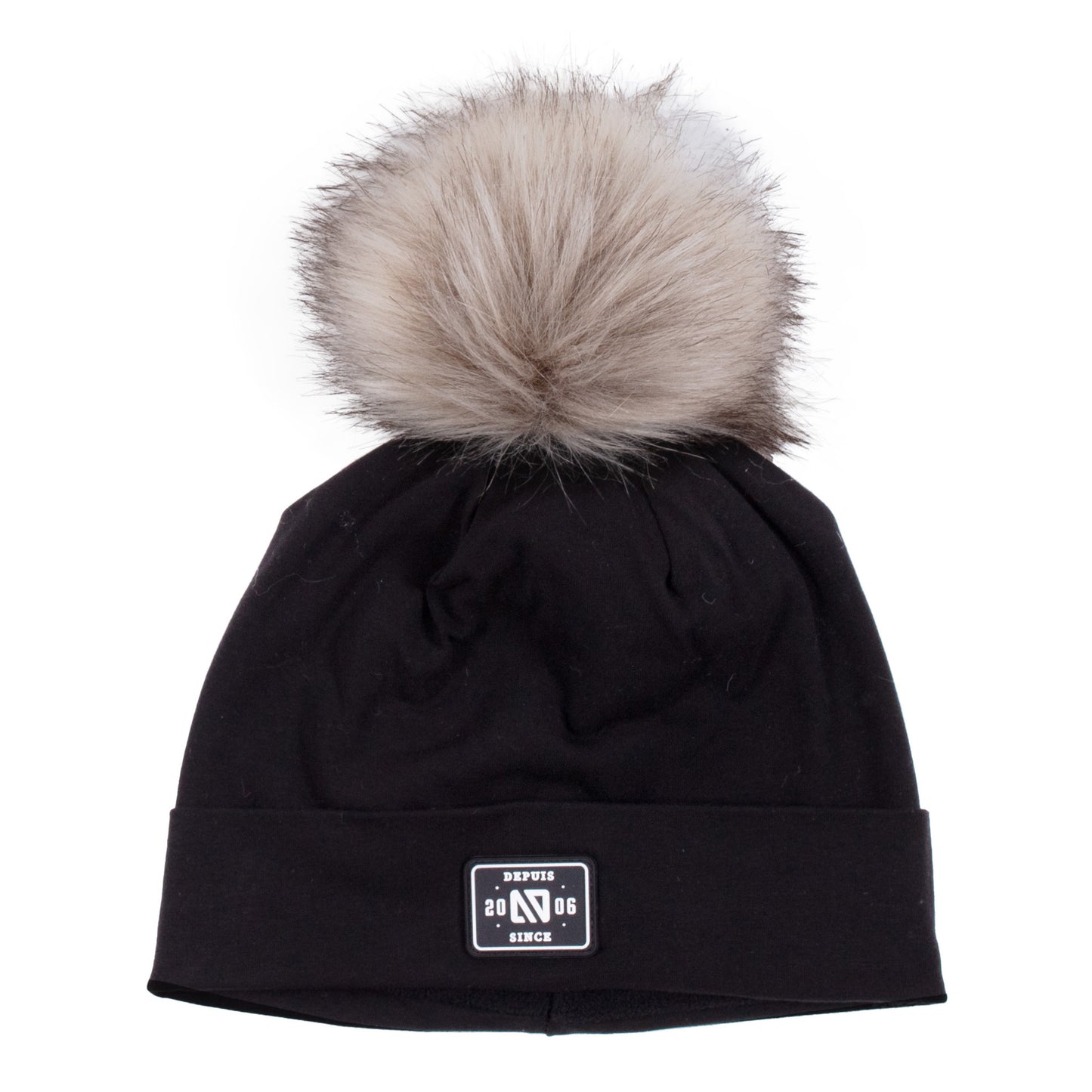 Tuque Mi-Saison noire avec pompon en fausse fourrure beige, en tissu doux, vue de face adaptée pour enfant.