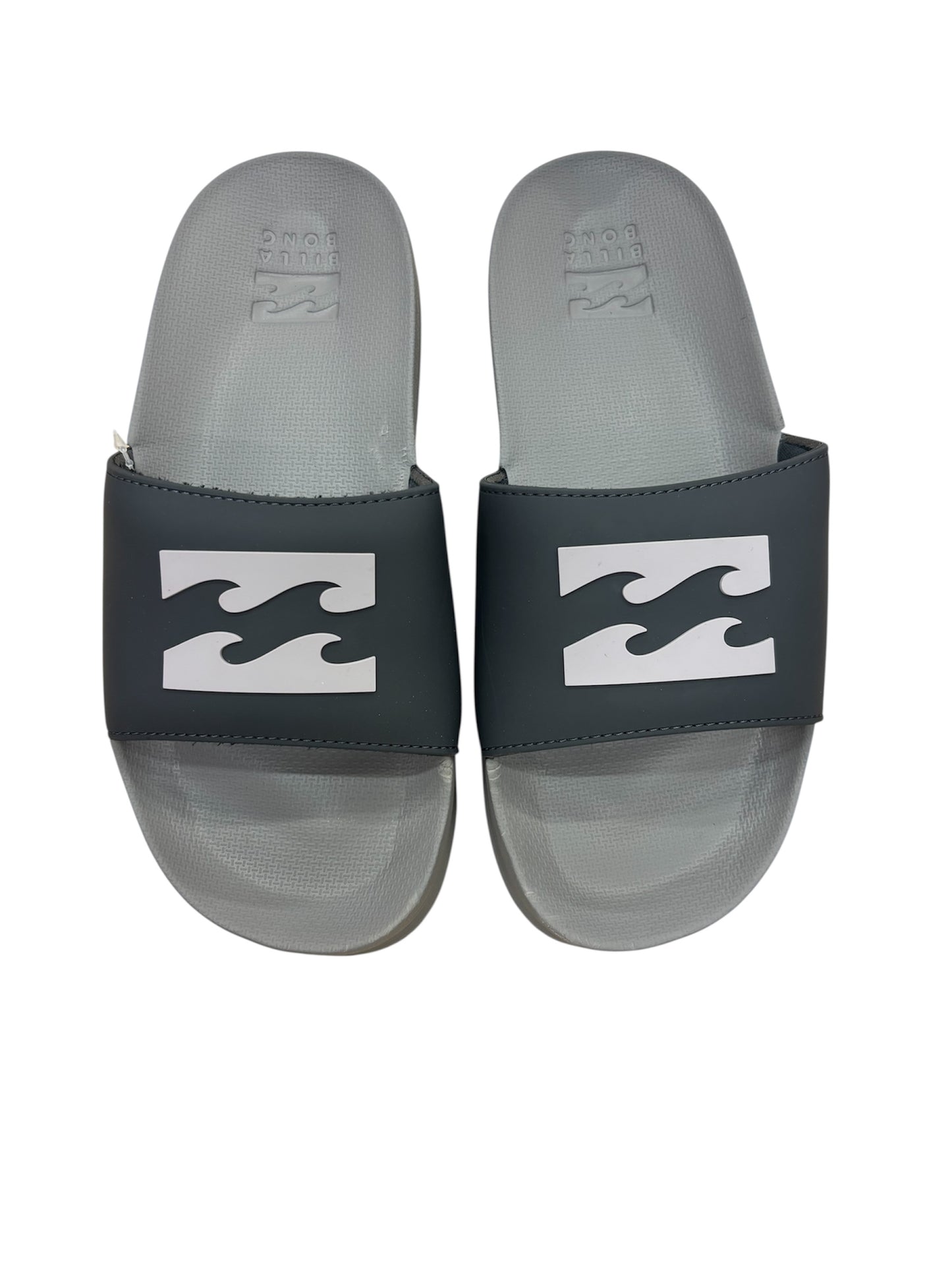 Sandales pour homme - Billabong noires et grises, style mule avec logo blanc, vue de dessus, matériau synthétique.