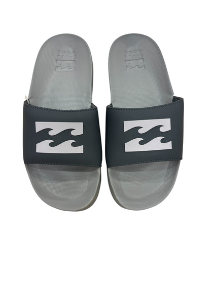 Sandales pour homme - Billabong noires et grises, style mule avec logo blanc, vue de dessus, matériau synthétique.