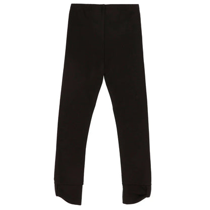 Legging - Nanö noir uni en coton, coupe ajustée pour enfant, vue de face sur fond blanc.