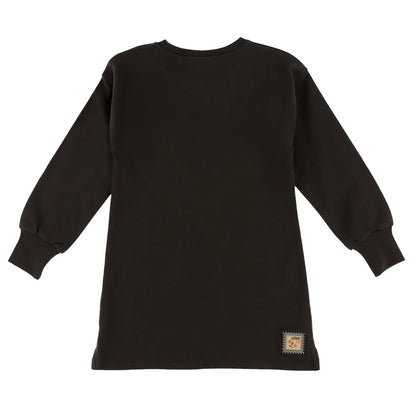 Tunique - Nanö noire en coton avec manches longues et col rond, pour enfant, vue de dos avec étiquette cousue près de l'ourlet.