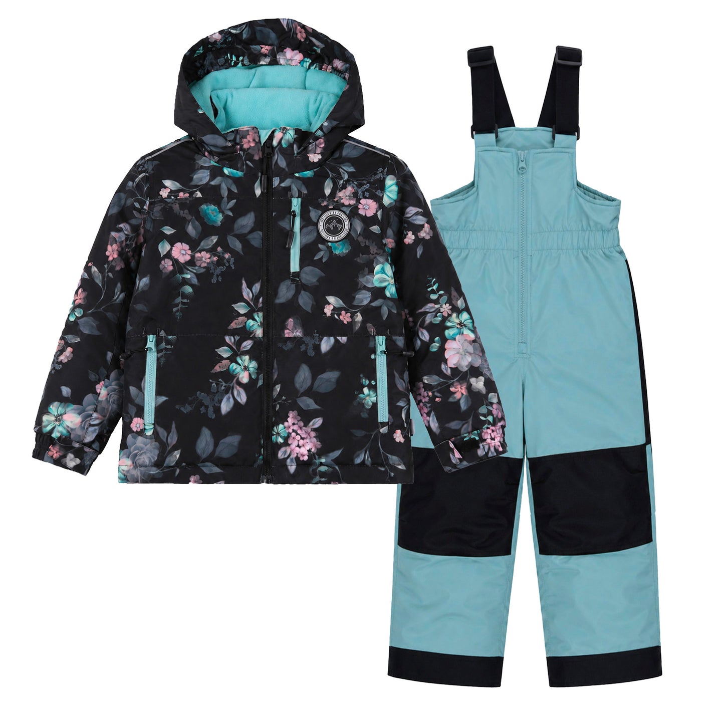Habit de neige - Peluche & Tartine ensemble enfant avec veste à capuche noire à imprimé floral rose et bleu, et pantalon salopette bleu ciel avec renforts noirs, vue de face.