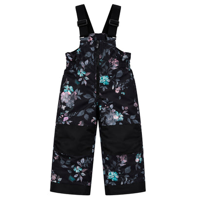 Habit de neige - Peluche & Tartine noir à motifs floraux roses et bleus, pantalon de ski enfant avec bretelles réglables, vue de face.