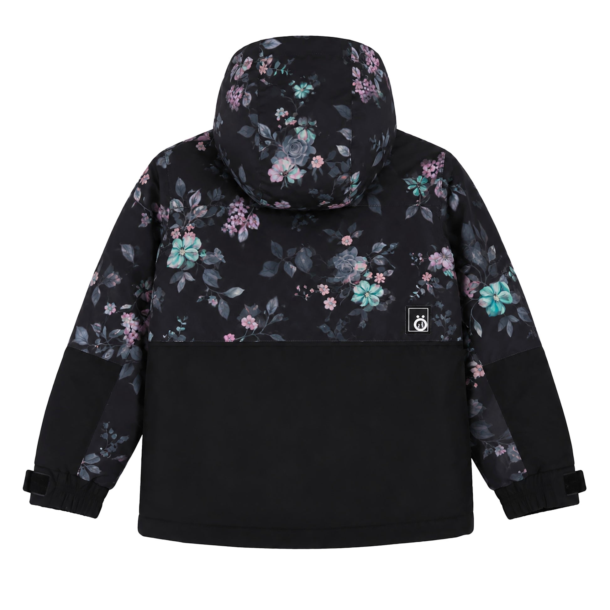 Manteau - Snö pour enfant, vue de dos, motif floral violet et vert sur fond noir avec capuche, partie inférieure unie noire en tissu technique.