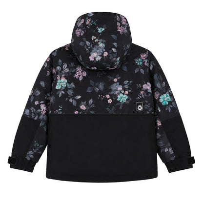 Manteau - Snö pour enfant, vue de dos, motif floral violet et vert sur fond noir avec capuche, partie inférieure unie noire en tissu technique.