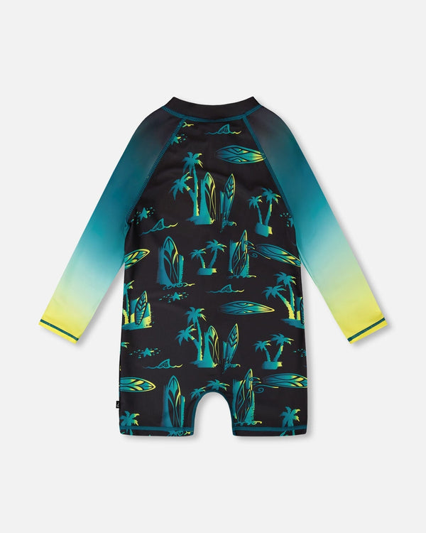 Maillot de bain - Deux Par Deux une pièce manches longues bleu dégradé motifs planches de surf et palmiers, vue de dos enfant