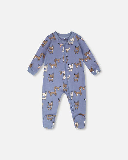 Pyjama - Deux Par Deux bleu avec motifs chiens marron et beige, en coton biologique, pour bébé, vue de face à manches longues et pieds fermés.