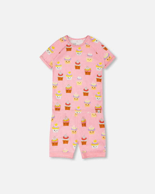 Pyjama deux-pièces - Deux Par Deux rose avec motifs cupcakes colorés, 100% coton biologique, pour enfant, vue de face portée à plat.