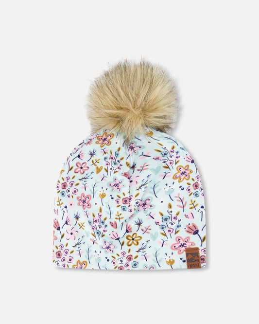 Tuque Mi-Saison - Deux Par Deux à pompon beige amovible, motifs floraux multicolores sur fond blanc, vue de dessus.