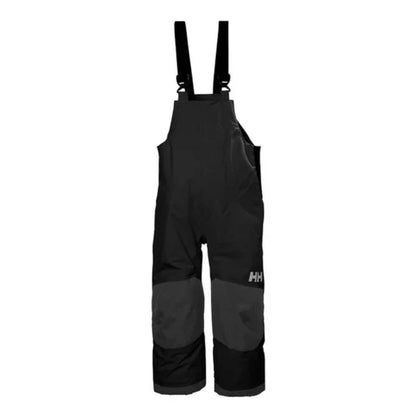Salopette de neige Rider - Helly Hansen noire avec renforts gris aux genoux et bretelles ajustables vue de face pour enfant
