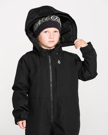 Habit de neige Little Flurry - Volcom noir pour garçon avec capuche et tuque à motifs porté sur mannequin vue de face