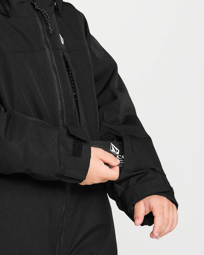 Habit de neige Little Flurry - Volcom noir pour enfant porté avec détail du poignet ajustable